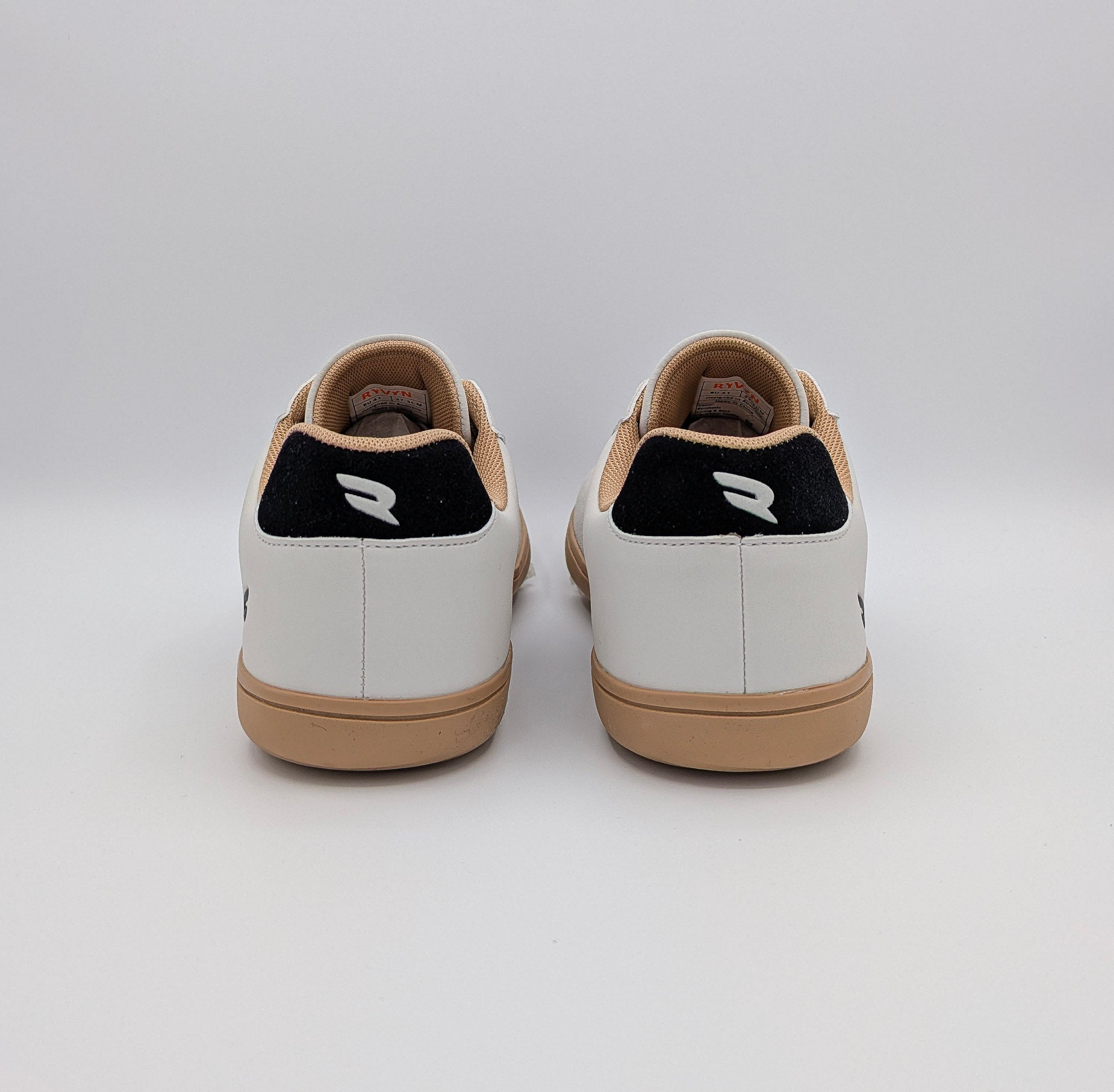 RYVYN ARC minimalist footwear in Off White Black heel view