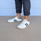 RYVYN ARC minimalist footwear in Off White Black worn lifestyle view