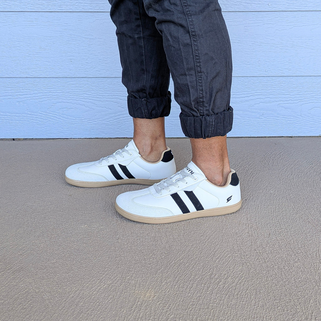RYVYN ARC minimalist footwear in Off White Black worn side view