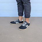 RYVYN INK minimalist footwear in Black Off White worn lifestyle view