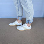 RYVYN SOL minimalist footwear in Off White Beige worn side view