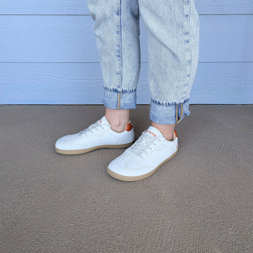 RYVYN VUE minimalist footwear in Off White Burnt Orange worn lifestyle view