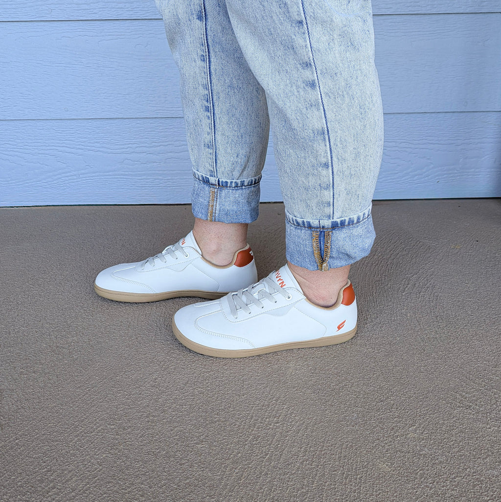 RYVYN VUE minimalist footwear in Off White Burnt Orange worn side view