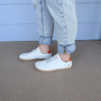 RYVYN VUE minimalist footwear in Off White Burnt Orange worn side view